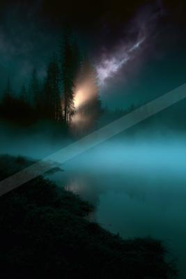 A night sky scene of an aurora, fog.