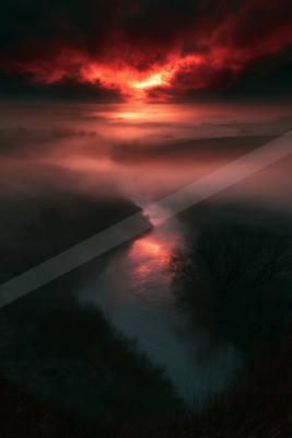 A serene sky scene of sunset, lake, sunrise.