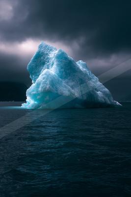 A blue hour water scene of ocean.