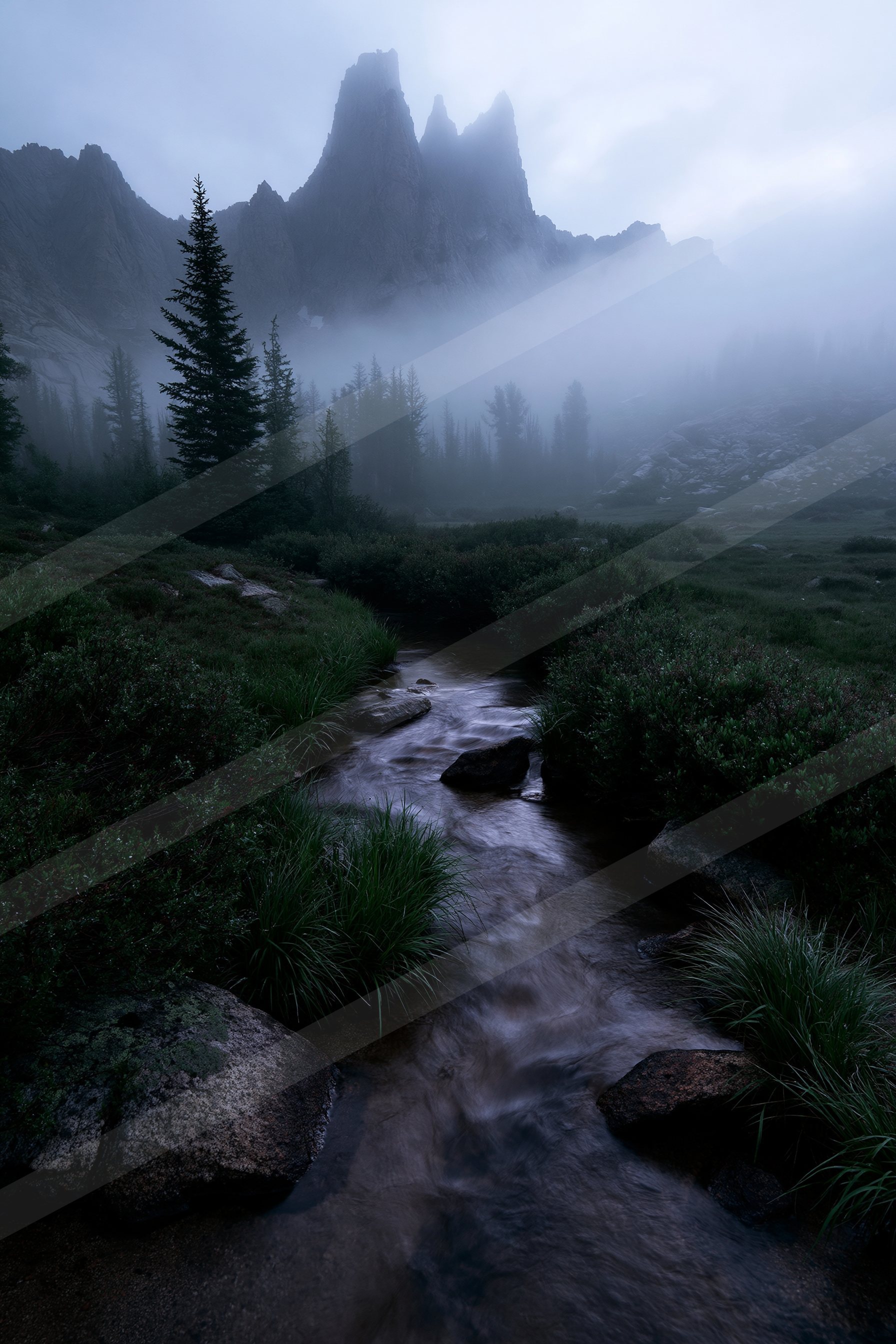 An ethereal water scene of a stream, fog.