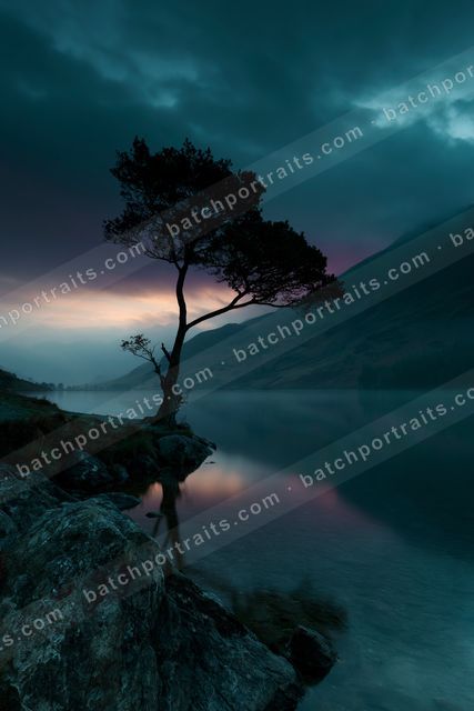 A night high contrast water scene of a lake, reflection.