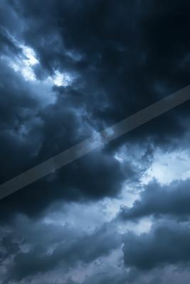 A night sky scene of clouds, storm.
