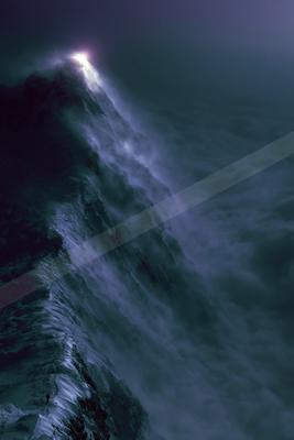 A dramatic water scene of ocean, storm, waterfall.
