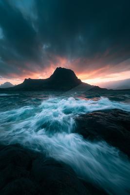 A blue hour long exposure water scene of ocean, storm.
