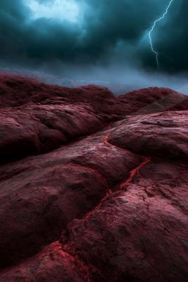 A dramatic sky scene of storm, rocks.