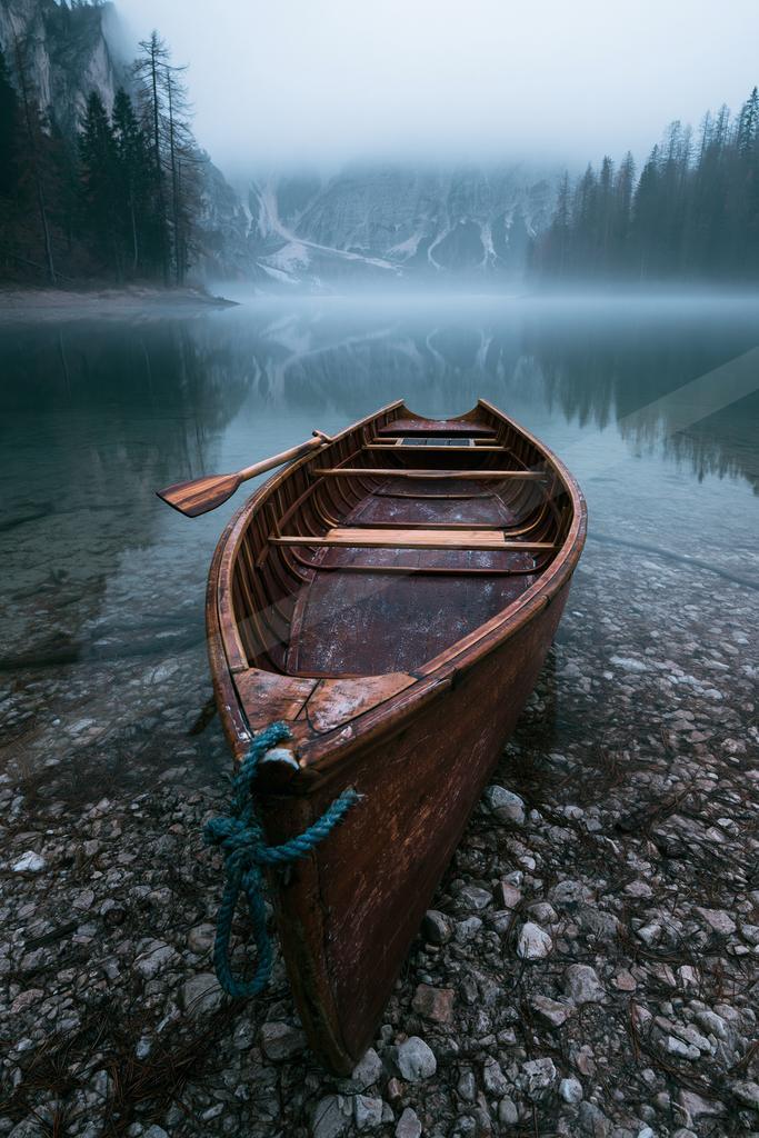 A serene long exposure water scene of lake, fog.