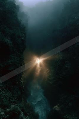 An ethereal long exposure water scene of a river, fog.