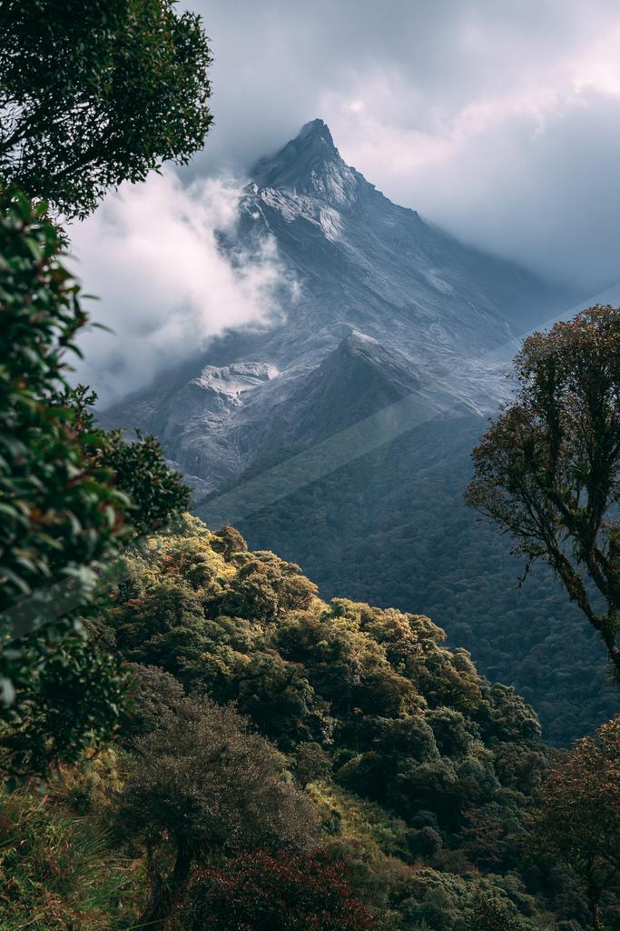 A moody landscape of mountains.