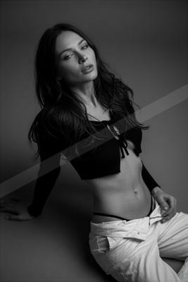 A black-and-white moody portrait.