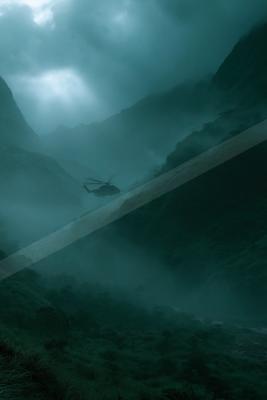 A black-toned moody photograph of valley, cliff, dam.