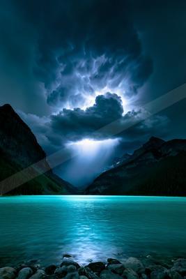 A blue hour sky scene of storm, lake, clouds.