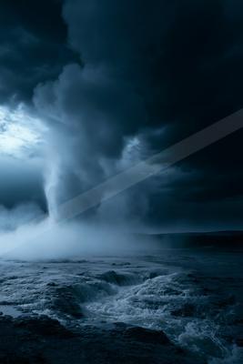 A black-toned moody photograph of geyser, beacon, breakwater.