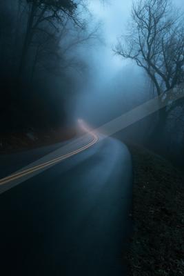 A night sky scene of storm, fog.
