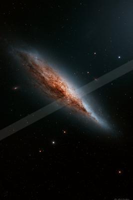 A stunning spiral galaxy dominates the frame, showcasing intricate dusty arms swirling around its core. The surrounding night sky is dotted with numerous stars 