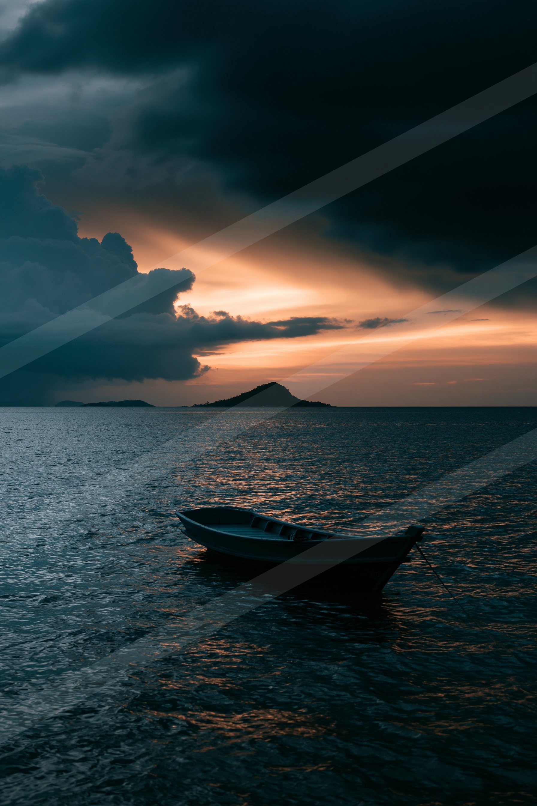A dramatic high contrast sky scene of a sunset, silhouette.