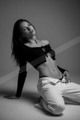 A black-and-white moody portrait.