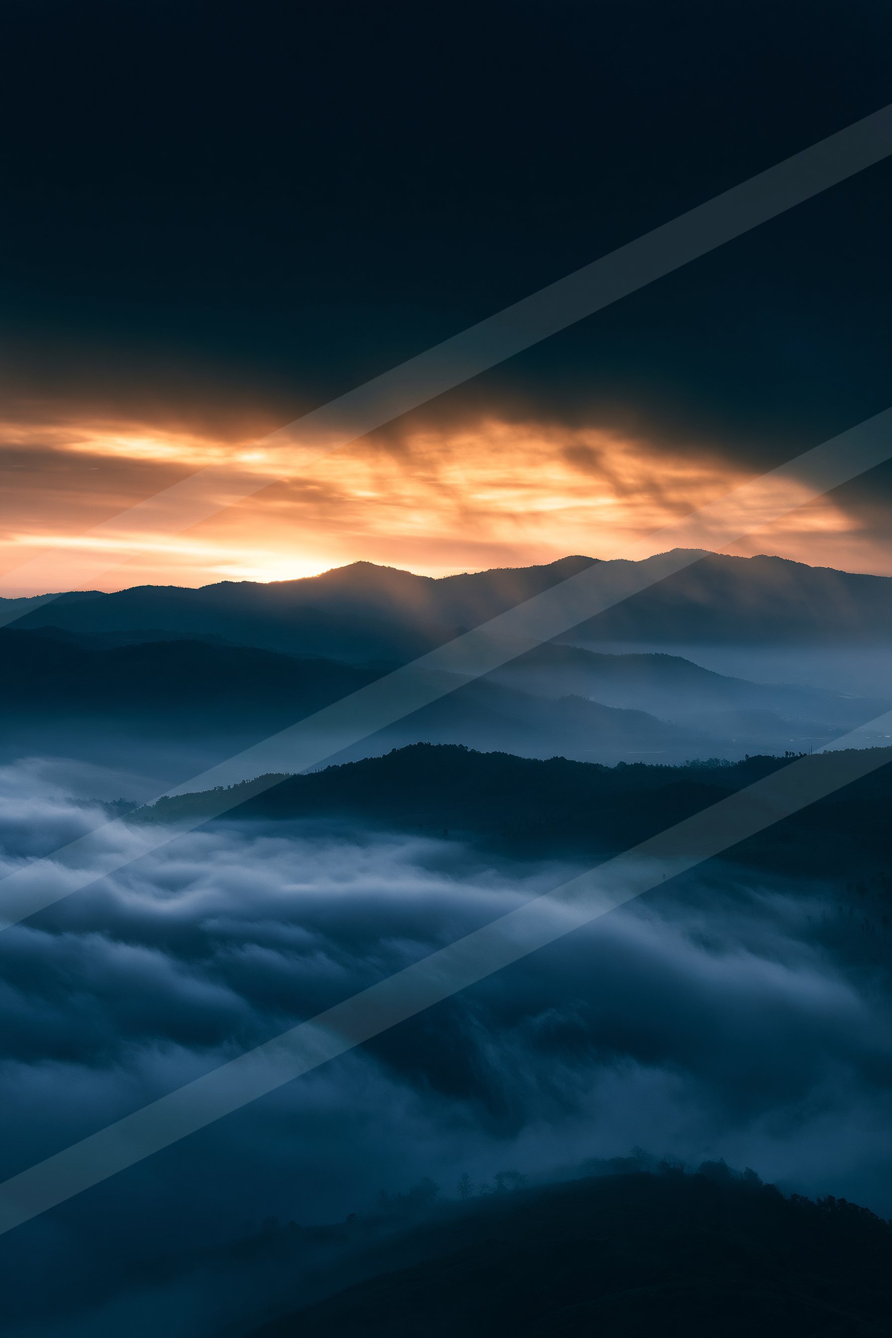 A blue hour panorama sky scene of a sunrise, fog.