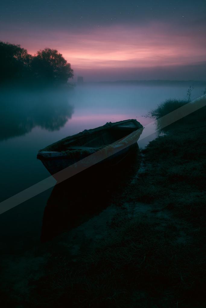 An old wooden boat rests on the misty shore of a calm lake under a colorful twilight sky with stars, surrounded by silhouetted trees and fog.