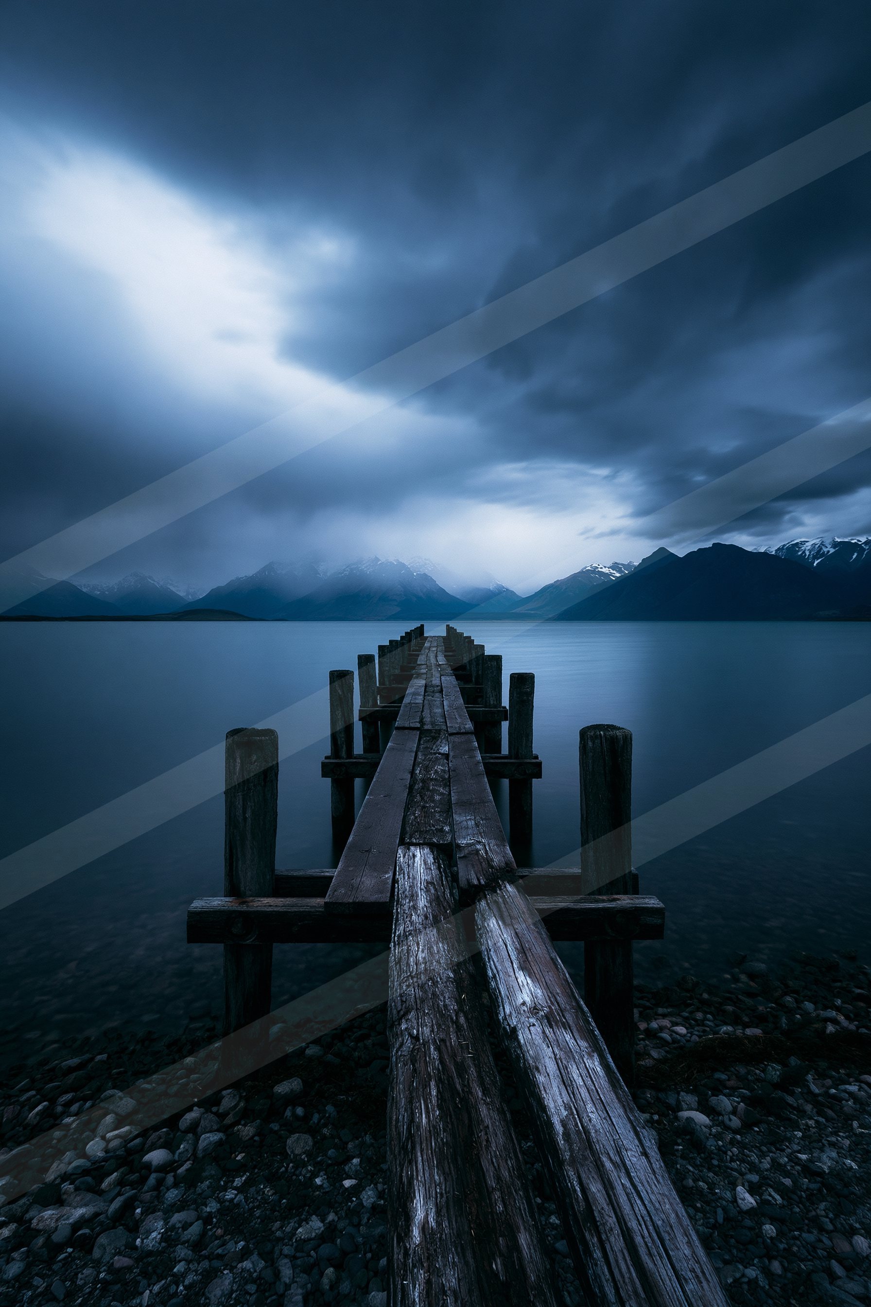 A blue hour long exposure water scene of a lake, reflection.
