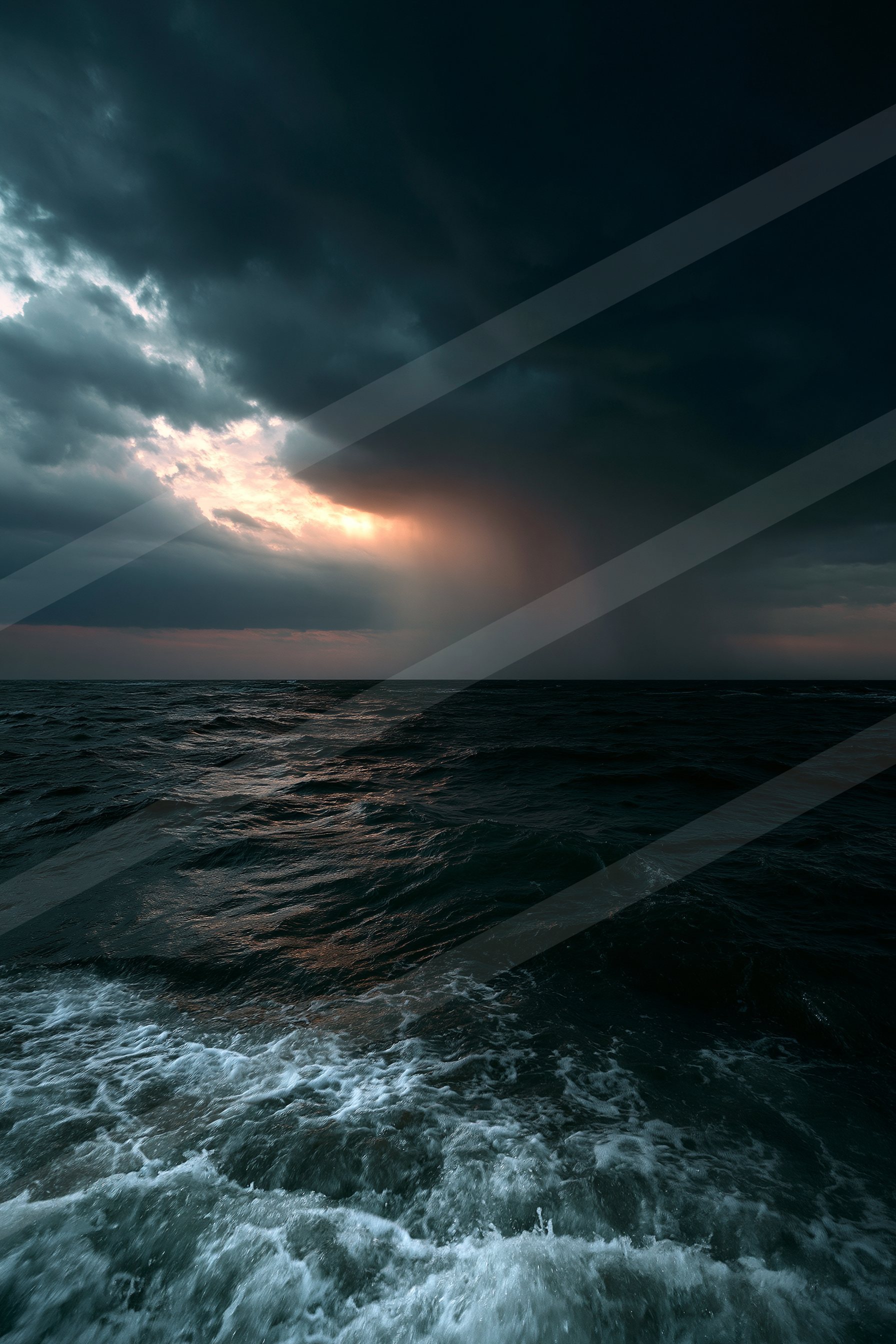 A dramatic high contrast water scene of an ocean, ripples.