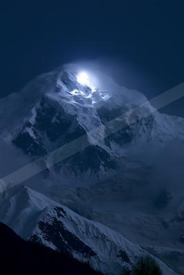 A night landscape of mountains.