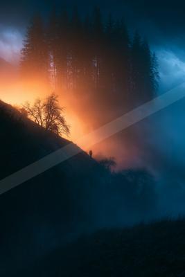 A black-toned moody photograph of volcano, alp, valley.