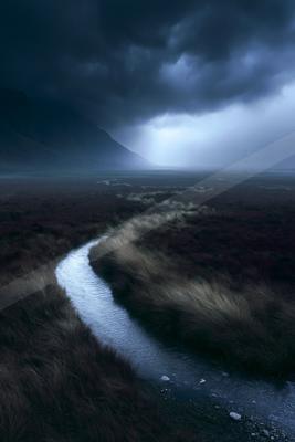 A night sky scene of storm, river, road.