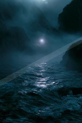 A moody water scene of ocean, waterfall.