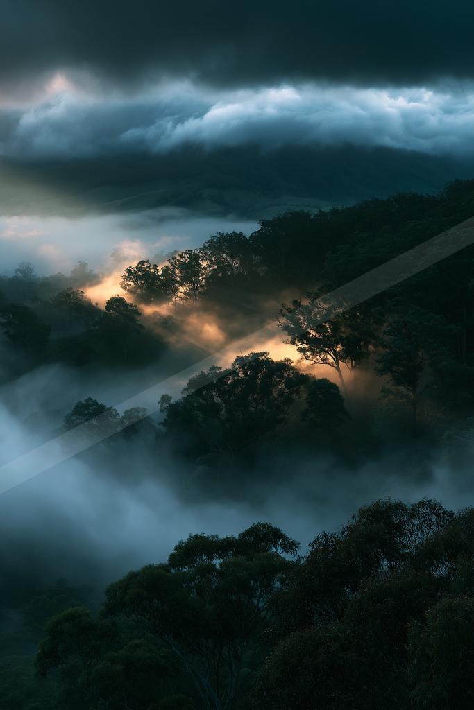 A night double exposure landscape of a valley, fog.