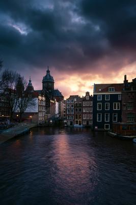 A blue hour long exposure sky scene of sunrise.