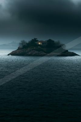A night water scene of ocean, fog.