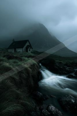 A serene long exposure water scene of river, mountains, waterfall.