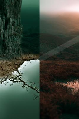 A moody nature scene of trees, lake, valley.