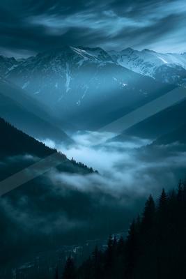 A night panorama landscape of a mountains, fog.