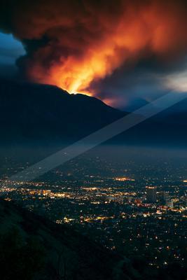 A black-toned moody photograph of volcano, alp, valley.