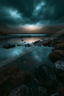 A mysterious long exposure water scene of an ocean, reflection.