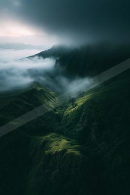 A serene mountain landscape shrouded in mist with lush greenery and a mysterious atmosphere.