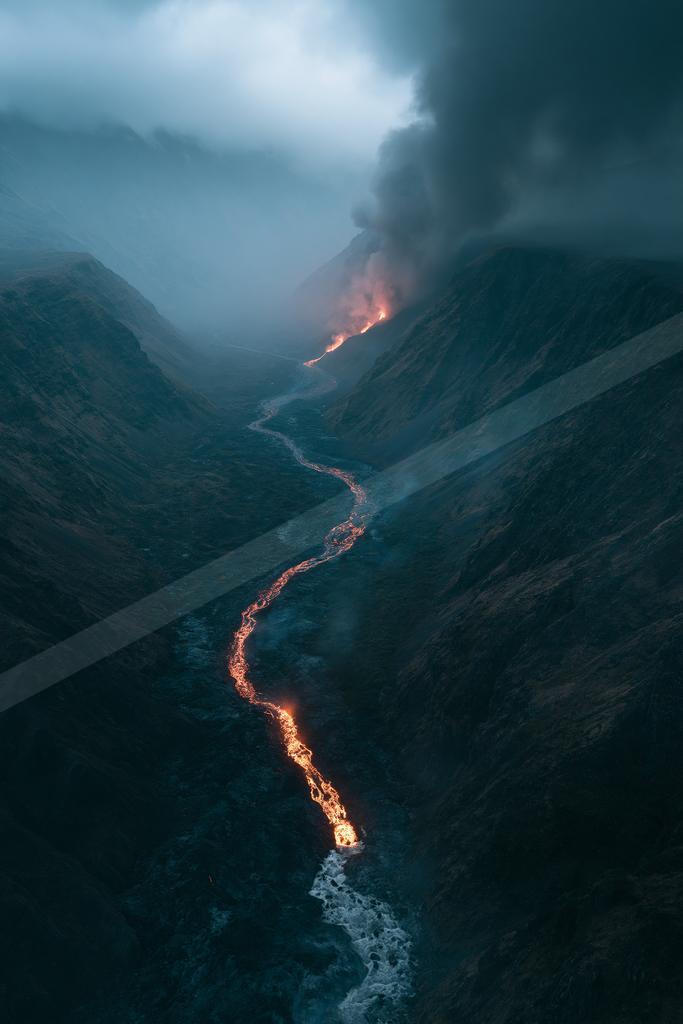 A night long exposure water scene of river, mountains, valley.