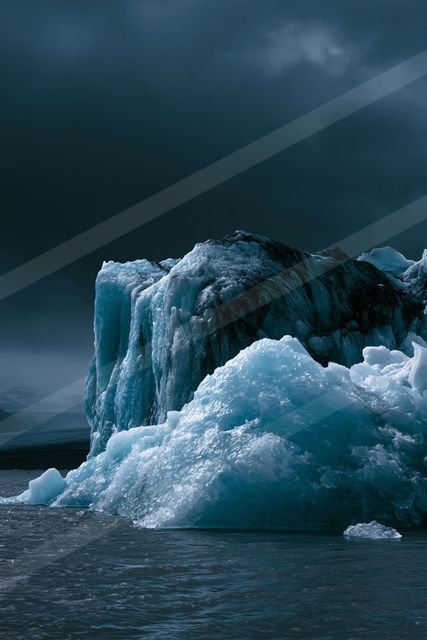A dramatic landscape of a glacier, ice.