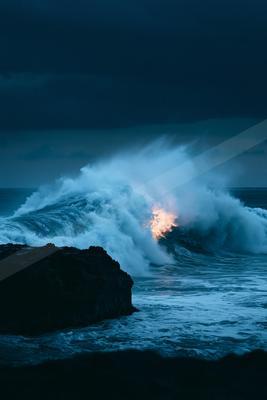A blue hour water scene of ocean.