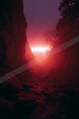 A night sky scene of sunrise, fog.