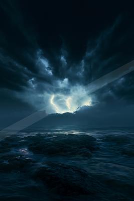 A night sky scene of storm, ocean, clouds.