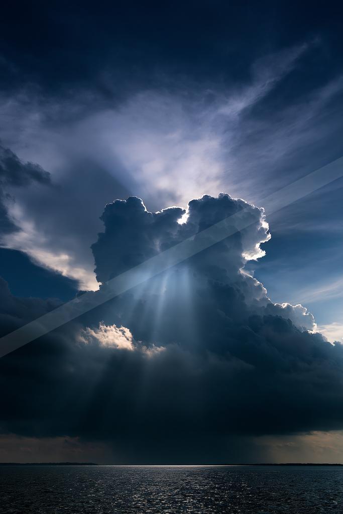 A dramatic sky scene of clouds, storm.