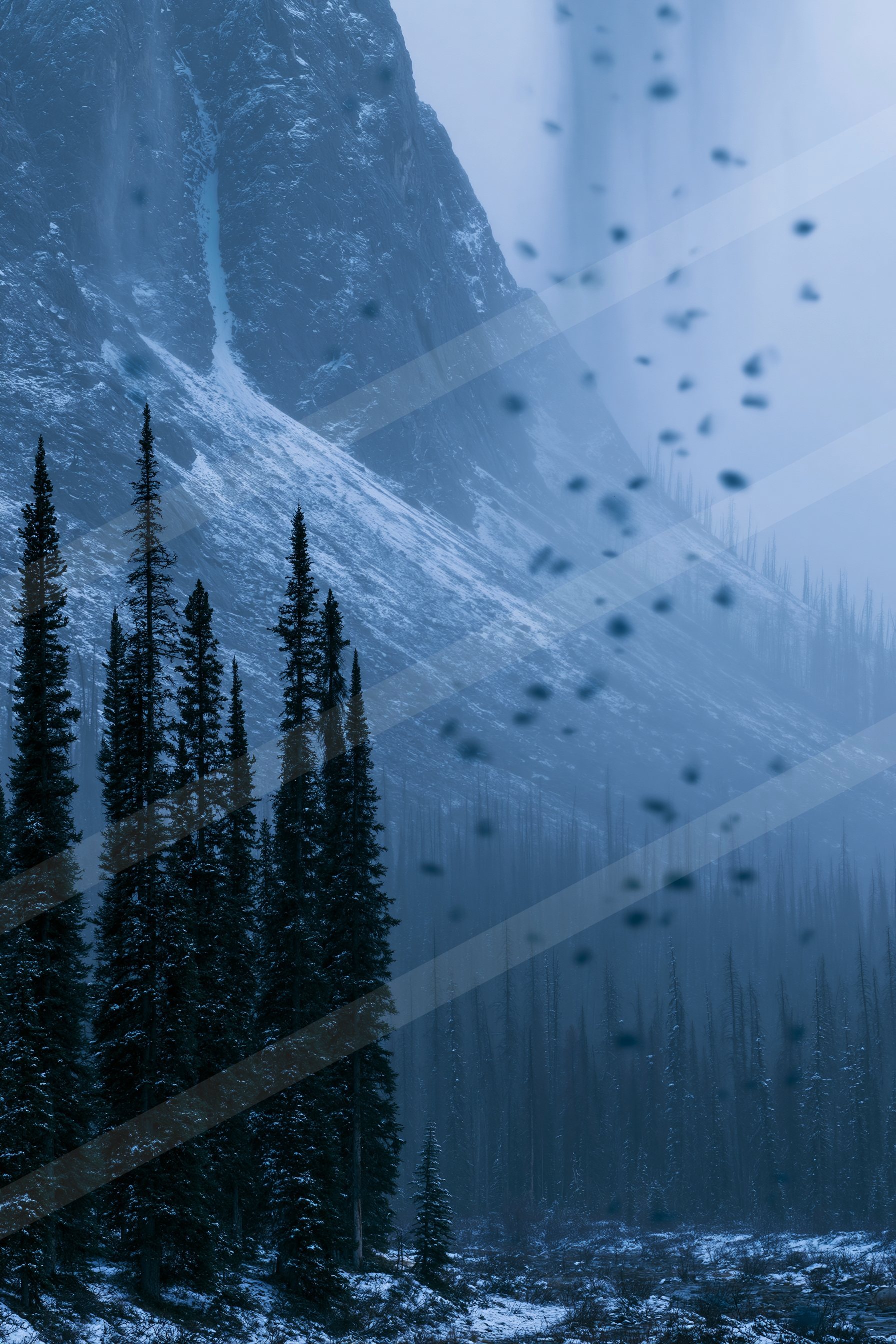 A mysterious landscape of a mountains, snow.