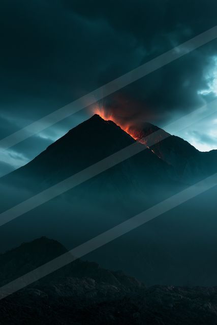 A dramatic landscape of a volcano, fire.