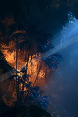 A black-toned moody photograph of spotlight, stage, volcano.