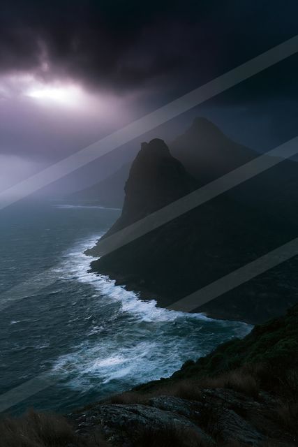 A mysterious water scene of a coastline.