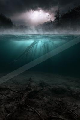 A night water scene of lake, river, waterfall.