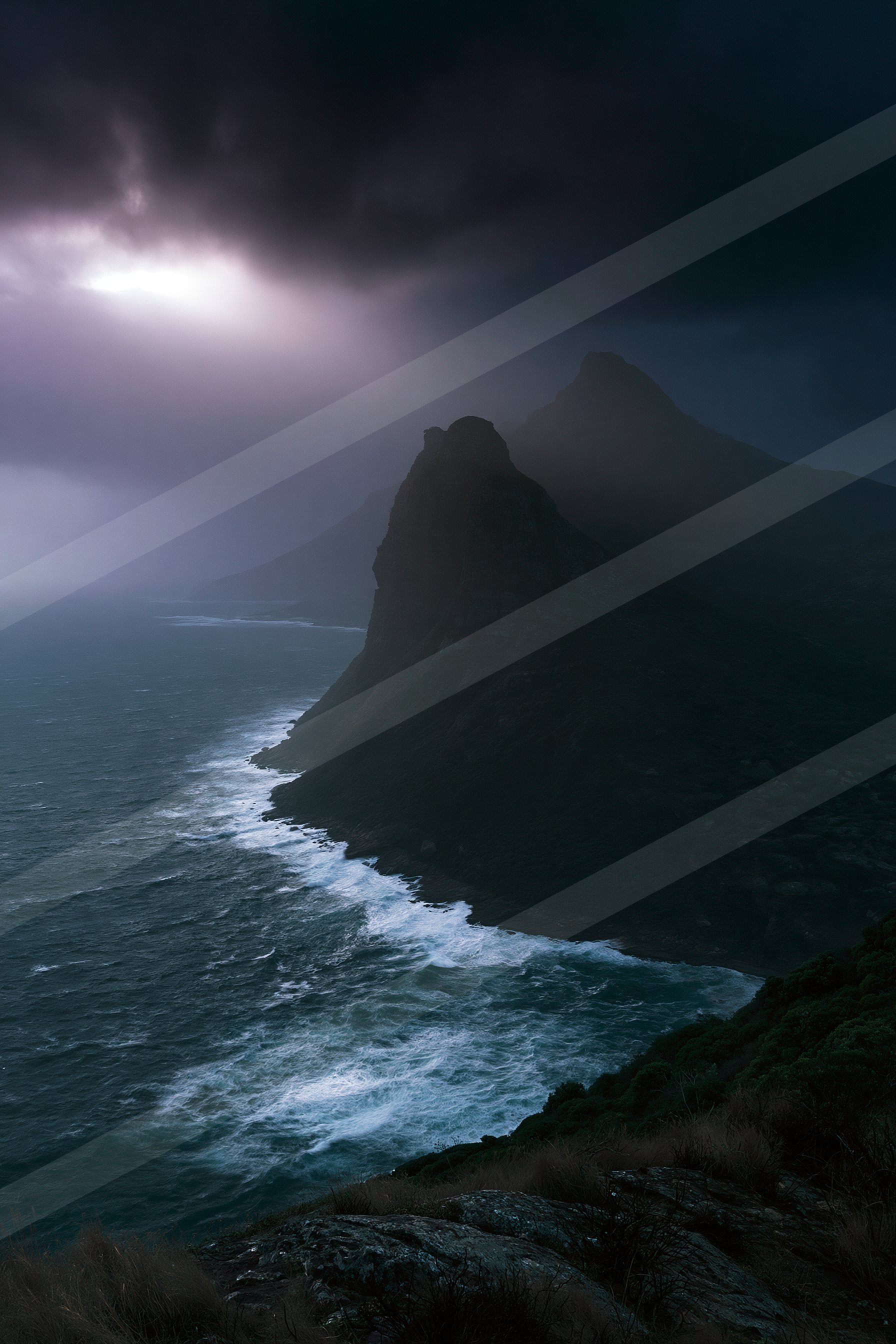 A mysterious water scene of a coastline.