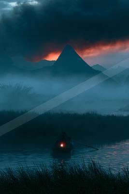 A dramatic landscape of mountains, lake, fog.